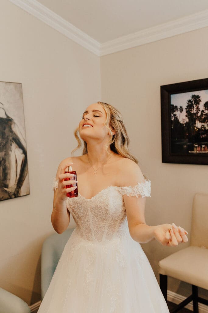 bride enjoying her morning getting ready for the wedding