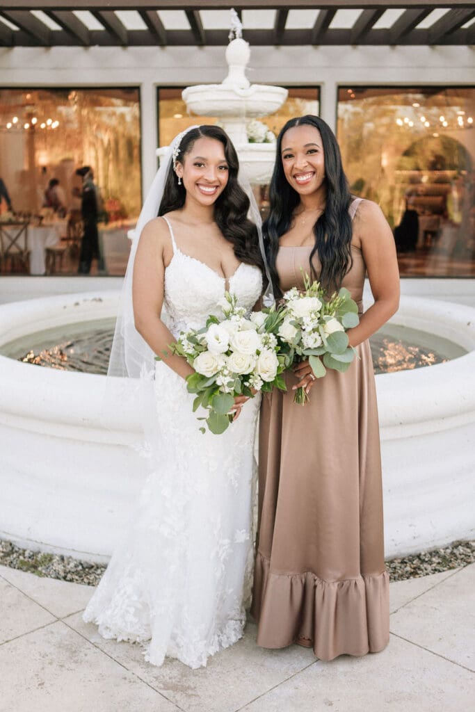 Maid Of Honor and bride after wedding glam for wedding portraits 