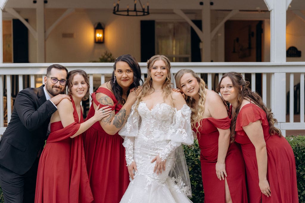 Wedding planning in action for the post wedding ceremony wedding photos with the bride and the wedding party.